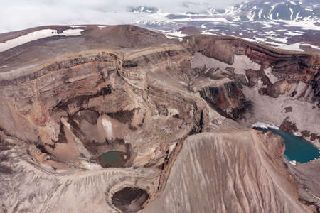 The blue lake in the crater of Gorely volcano. Kamchatka Peninsula, Russiaの写真素材