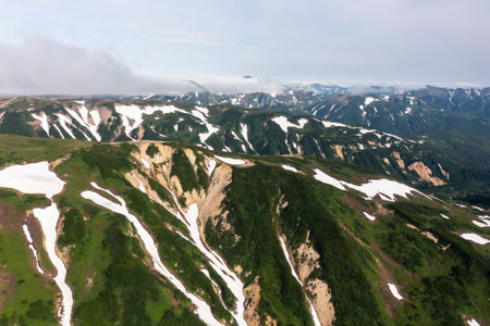Beautiful mountain landscape of Vilyuchinsky Pass at sunny day. Kamchatka Peninsula, Russiaの写真素材