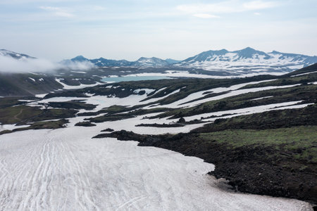 Gorely Volcano crater lake with Mutnovsky Volcano on the background. Kamchatka, Russiaの写真素材