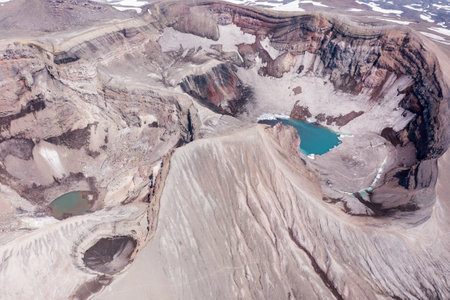 The blue lake in the crater of Gorely volcano. Kamchatka Peninsula, Russiaの写真素材