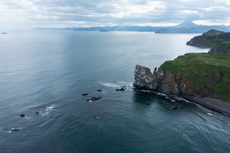 Khalaktyrsky beach and rocky Cape Vertical on Kamchatka peninsula. Russia, Pacific oceanの写真素材