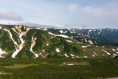 Beautiful mountain landscape of Vilyuchinsky Pass at sunny day. Kamchatka Peninsula, Russiaの写真素材