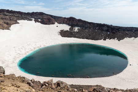 Gorely Volcano crater lake with Mutnovsky Volcano on the background. Kamchatka, Russiaの写真素材