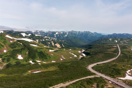 Beautiful mountain landscape of Vilyuchinsky Pass at sunny day. Kamchatka Peninsula, Russiaの写真素材