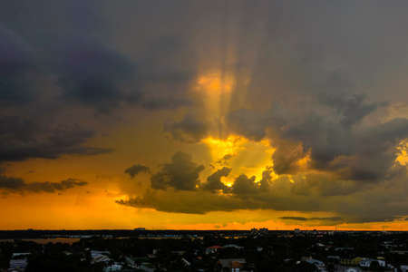 This was taken at Daytona Beach Shores in Florida. I was trying to capture the last of the light at sunset as it came up through a massive cloud hanging over the river. I captured this at 35mm and it does not do justice to what I saw that evening. It was one of the best sunsets I have ever seen.の写真素材