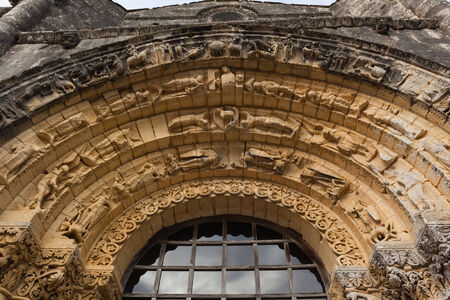 West facade archivolts Detail  of Notre-Dame de l'Assomption de Feniouxchurch in Charente Maritime region of Franceの写真素材