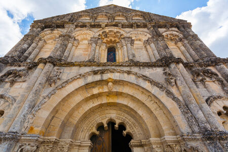 Wide angle view of  facade in Petit Palais et Cornemp romanesque chruch in  in the Gironde department of Franceの写真素材
