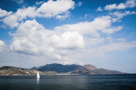 Sail boat cruising off  Aegina island, Greeceの写真素材