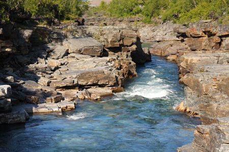 Flowing river through canyon, Abisko National Park in Sweden