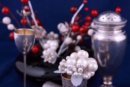 Various antique silver objects in studio light
