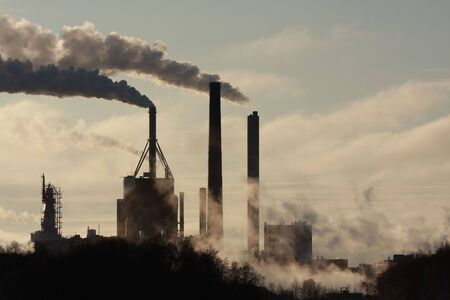 Smoke stack coming from a manufacturing plant