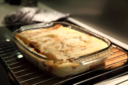 Fresh hot lasagna out of the ovenの写真素材