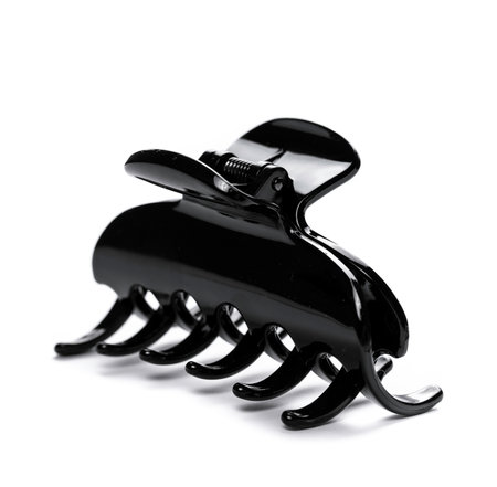 Black hair clip isolated on white background.の写真素材
