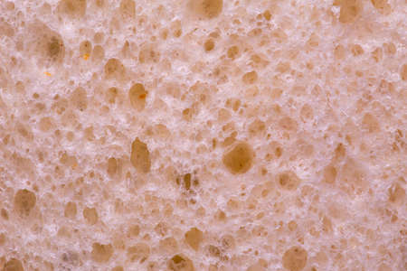 Wheaten white bread loaf texture, close-up macro shotの写真素材