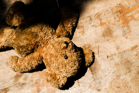 abandoned doll teddy bear loneliness and Homeless conceptの写真素材