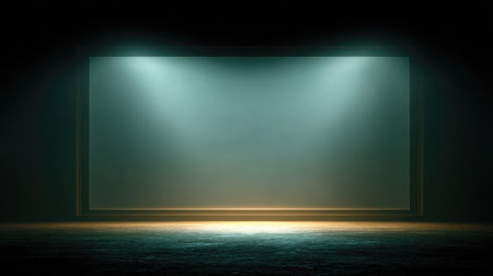 Tightly framed image of blank cinema screen glowing slightly in a dark roomの素材