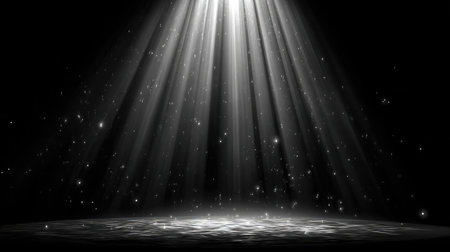 Abstract view of spotlight rays dispersing in dark space with subtle dust particlesの素材