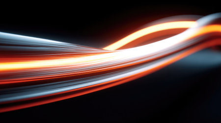 Abstract patterns formed by neon tubes glowing brightly against a pitch-black backgroundの素材