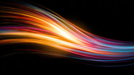 Abstract patterns formed by neon tubes glowing brightly against a pitch-black backgroundの素材