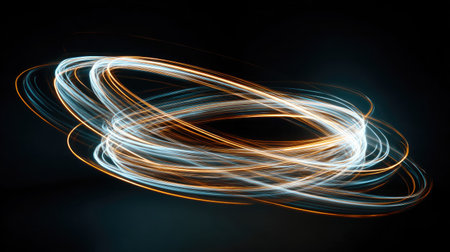 Circular neon shapes in motion blur forming artistic light trails in the darkの素材