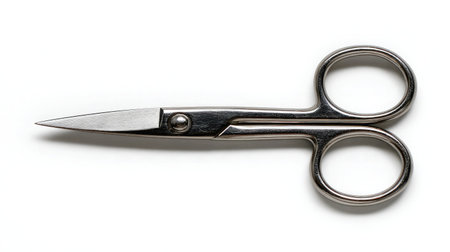 Isolated image of mustache scissors with curved handles and slim blades, white backgroundの素材