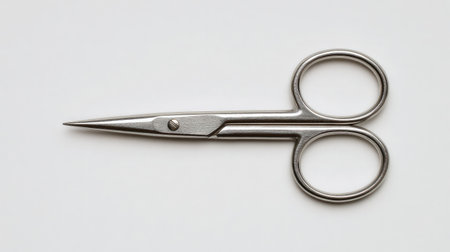Top-down view of mustache scissors with precision tips, isolated against white backgroundの素材