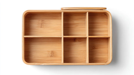 Minimalist wooden storage box with compartments, top-down view on plain white backgroundの素材