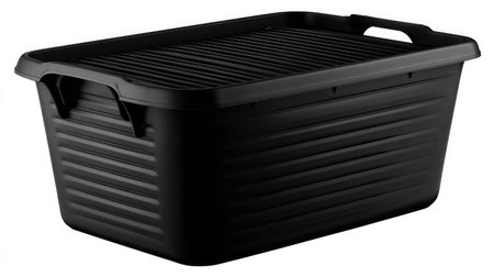 Single black plastic storage tote with built-in handle and grooved lid isolated on whiteの素材