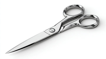 Minimalist image of scissors with narrow tip and sleek handle design, isolated on whiteの素材