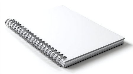 A blank spiral notebook on a white background, perfect for creative projects, note taking, and brainstorming ideas. Ideal for office and personal use.の素材