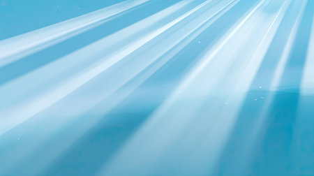 This serene image features gentle rays of light breaking through a soft blue sky, creating a tranquil and dreamy atmosphere, perfect for backgrounds.の素材