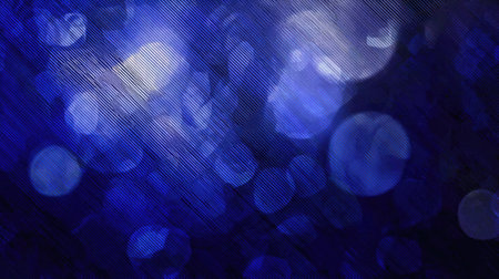 This abstract blue background features soft bokeh lights and textured patterns, creating a dreamy atmosphere ideal for various design projects.の素材