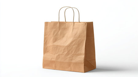 A plain brown paper bag with twisted handles, showcasing minimalistic design, ideal for packaging, shopping, or storage while emphasizing sustainability.の素材