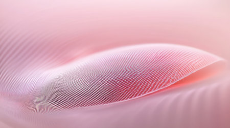 A close-up shot of a pink flamingo feather, highlighting its delicate texture and vibrant hue, set against a soft pink background.の素材