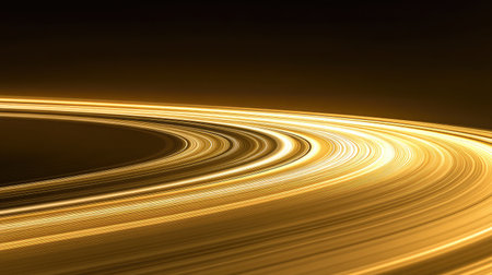 A close-up of Saturn's rings, displaying their intricate patterns and divisions, set against the planet's golden hues and the dark void beyond.の素材