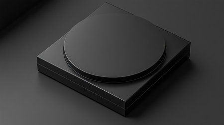 This image features a striking black circular shape resting on a square base, embodying minimalism and modern design, perfect for artistic projects and product showcases.の素材
