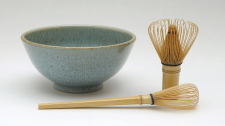 Explore the beauty of Japanese culture with this elegant tea ceremony set featuring a stunning blue bowl, matcha whisk, and bamboo utensils ideal for relaxation and wellness rituals.の素材