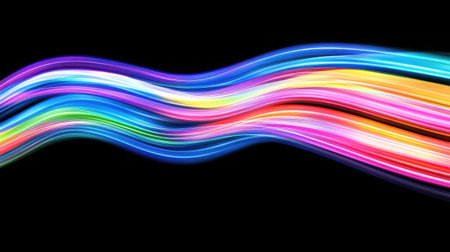 Colorful light waves create a stunning abstract pattern against a dark background, perfect for digital art, design projects, or modern visual presentations.の素材