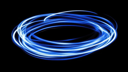 This image features abstract blue light trails in circular motion, creating a captivating visual effect. Ideal for modern design projects and artistic themes.の素材