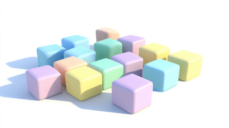 A vibrant collection of pastel-colored building blocks scattered on a white surface, perfect for stimulating creativity and learning in children through play and exploration.の素材
