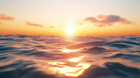 Witness the breathtaking beauty of a serene ocean at sunrise, with gentle waves reflecting soft light and creating a peaceful atmosphere perfect for relaxation and inspiration.の素材