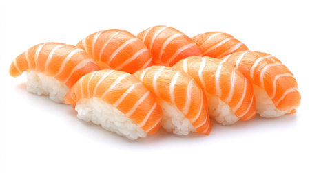 Close-up of salmon nigiri on a clean white backdrop with wasabi and pickled gingerの素材