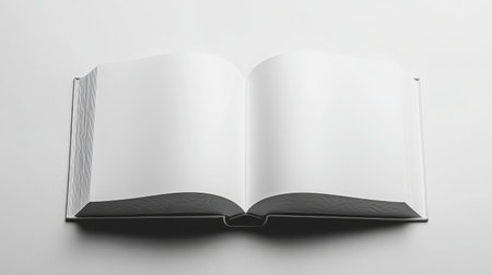 A minimalistic composition of a book with a plain cover centered on a white background.の素材