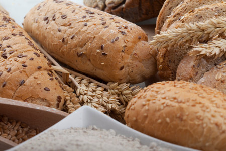 fresh bread and wheat on the wooden