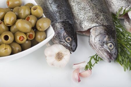 fresh trout on a cutting boardの写真素材