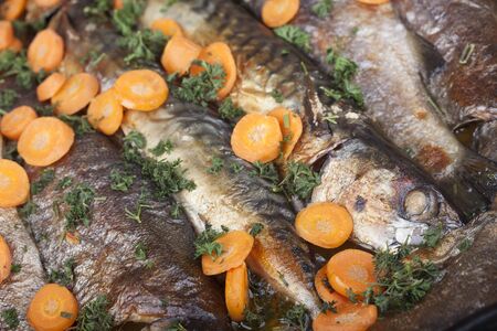 Fish dish - fried trout with vegetablesの写真素材