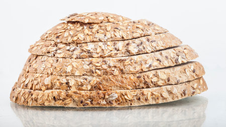 fresh bread and wheat on the white wooden