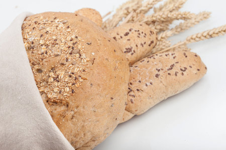 fresh bread and wheat on the wooden