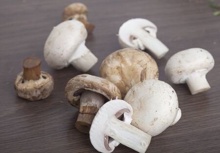 fresh champignon on wooden backgroundの写真素材