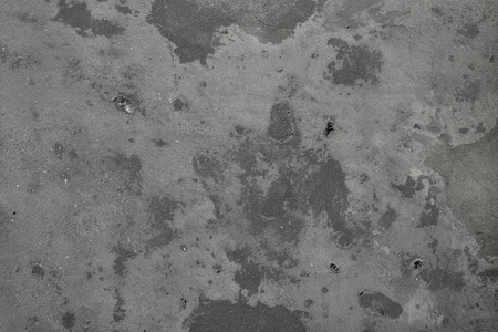 perfect trashy stone wall background with drill holes that can be used as a screensaver or to support a specific authentic and realistic designの写真素材